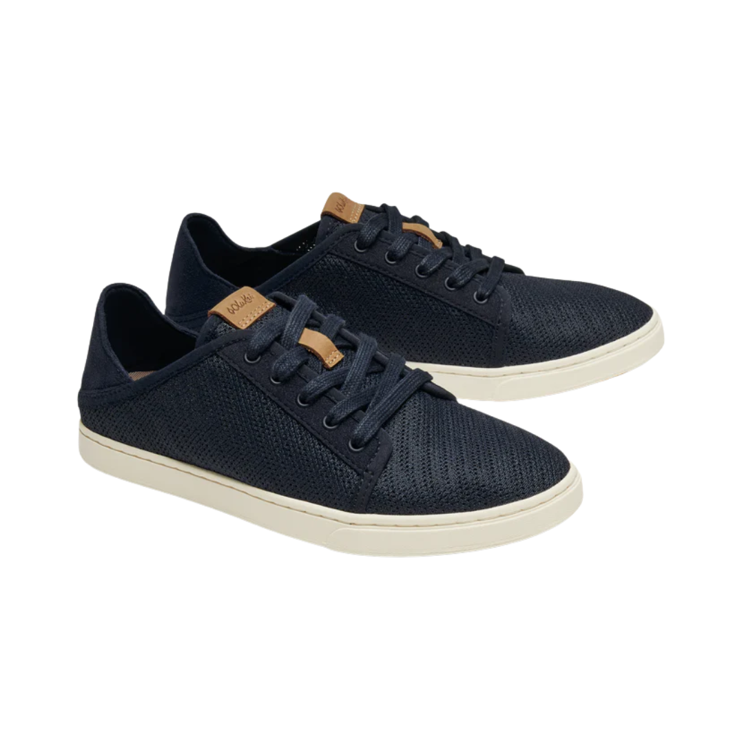 Side view of Women’s Olukai Pehuea Li sneaker in trench blue – featuring lightweight mesh upper, drop-in heel® design, and wet-grip rubber pods for traction.