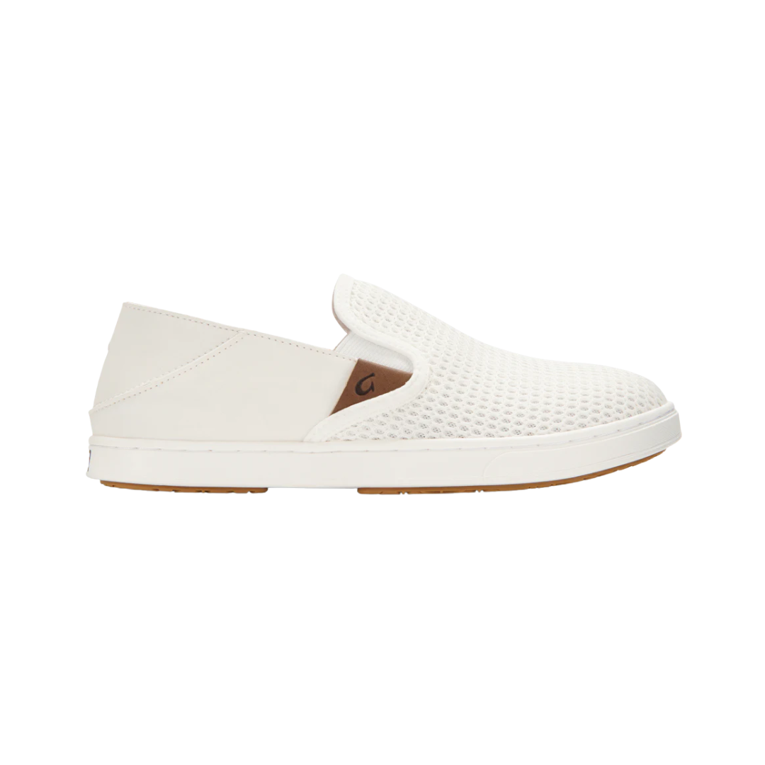 Side View of Women’s Olukai Pehuea in bright white/bright white – featuring a breathable mesh upper, collapsible Drop-In Heel®, and a cushioned EVA footbed.