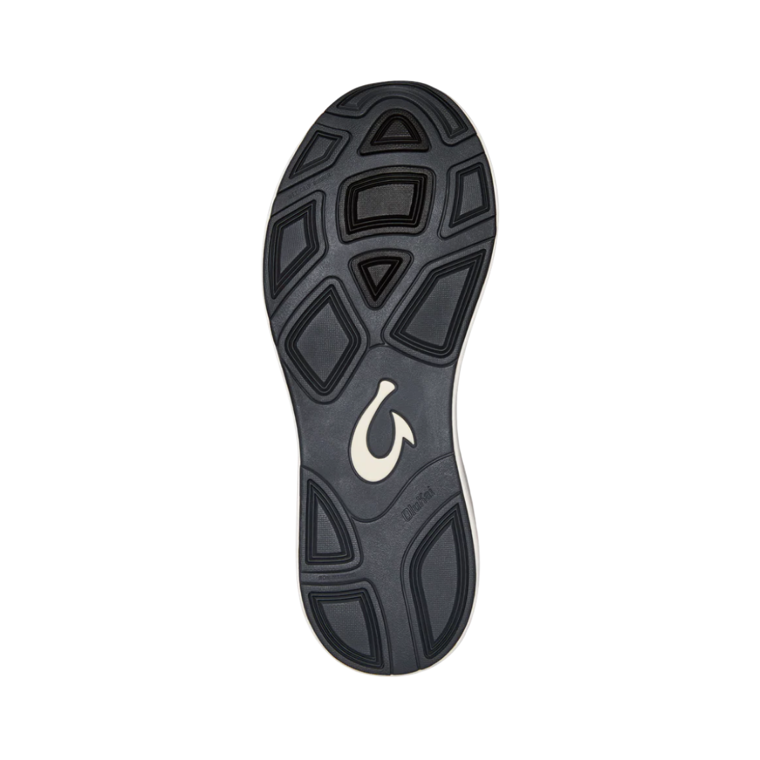 Bottom View of Men’s Olukai Holo casual sneaker in dark shadow – featuring a non-marking rubber outsole, traction pods for grip, and flexible design for natural movement.