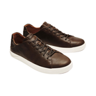 Side view of Men’s Olukai Lae‘Ahi Li ‘Ili sneaker in dark wood – featuring premium leather construction, cushioned footbed, and lightweight rubber outsole for everyday comfort.