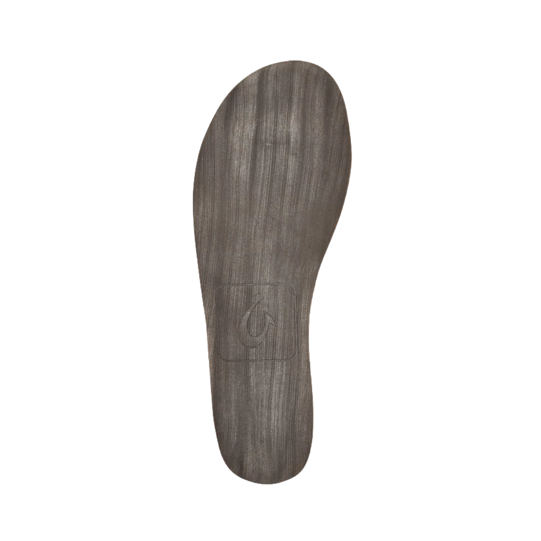 Bottom View of Men’s Olukai Moloa Slipper in dark wood – featuring a non-marking rubber outsole, traction pods for stability, and flexible construction for natural movement.