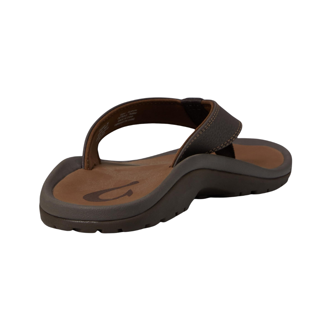 Angled view of Men’s Olukai Ohana sandal in Dark Java/Ray – featuring a quick-drying synthetic strap, cushioned anatomical footbed, grippy outsole, and durable, water-friendly build ideal for all-day island-inspired wear.