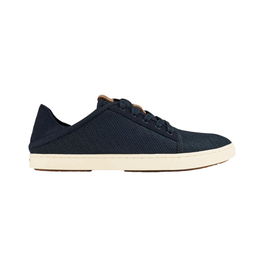 Side View of Women’s Olukai Pehuea Li lace-up sneaker in trench blue – featuring a breathable mesh and canvas upper, removable dual-density footbed, and lightweight EVA midsole for all-day comfort.