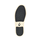 Bottom View of Women’s Olukai Pehuea slip-on sneaker in pavement – featuring a durable non-marking rubber outsole, enhanced traction pods, and flexible support for versatile wear.
