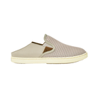 Side View of Women’s Olukai Pehuea slip-on sneaker in tapa – featuring a breathable mesh upper, dual elastic side panels, and a removable cushioned footbed for all-day comfort.