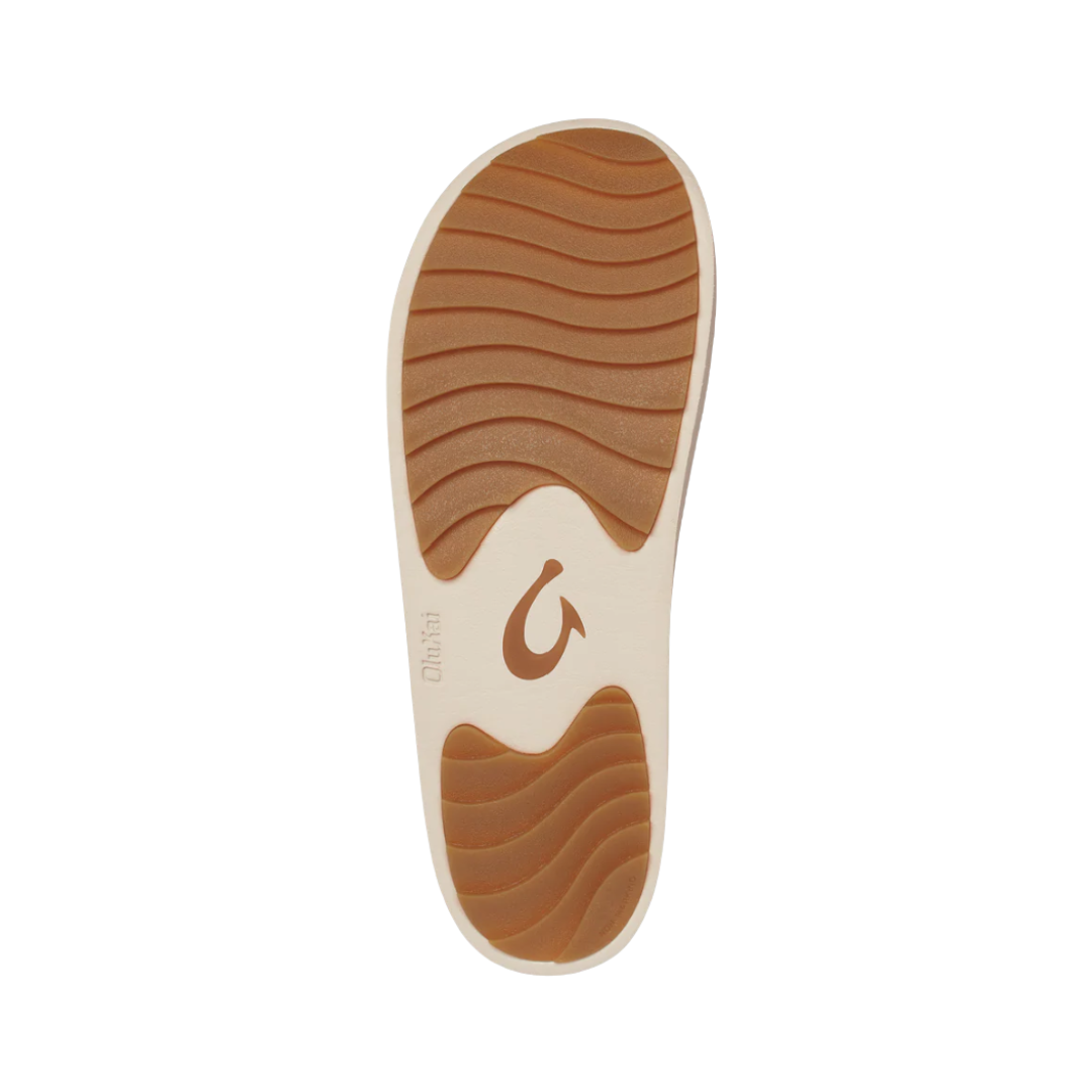 Bottom View of Women’s Olukai Pupu Mau in tapa – featuring a durable non-marking rubber outsole, enhanced traction pods, and flexible comfort for everyday wear.