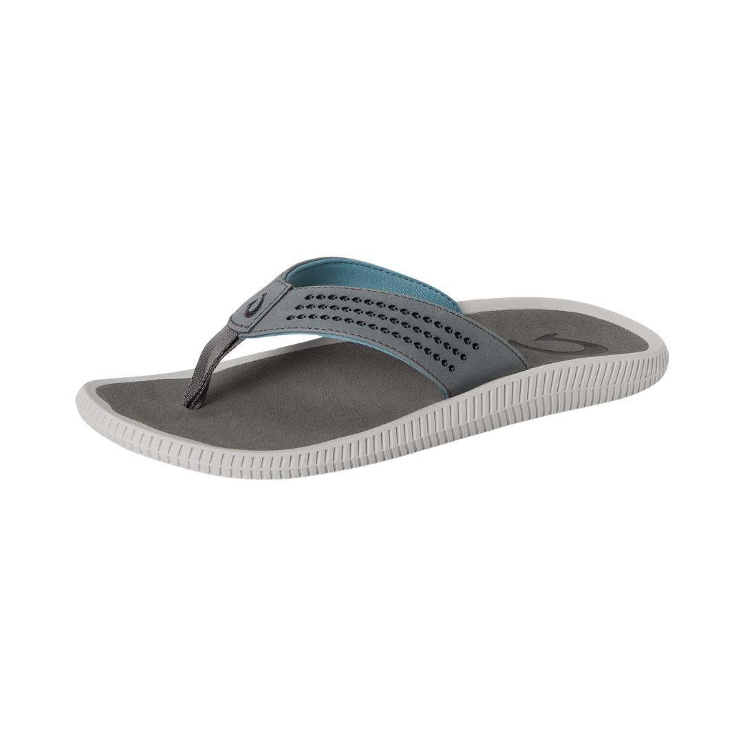 Side view of Men’s Olukai Ulele sandal in stone – features include a water-friendly synthetic strap, cushioned anatomical footbed, wet grip rubber outsole, and lightweight construction built for both land and water use.