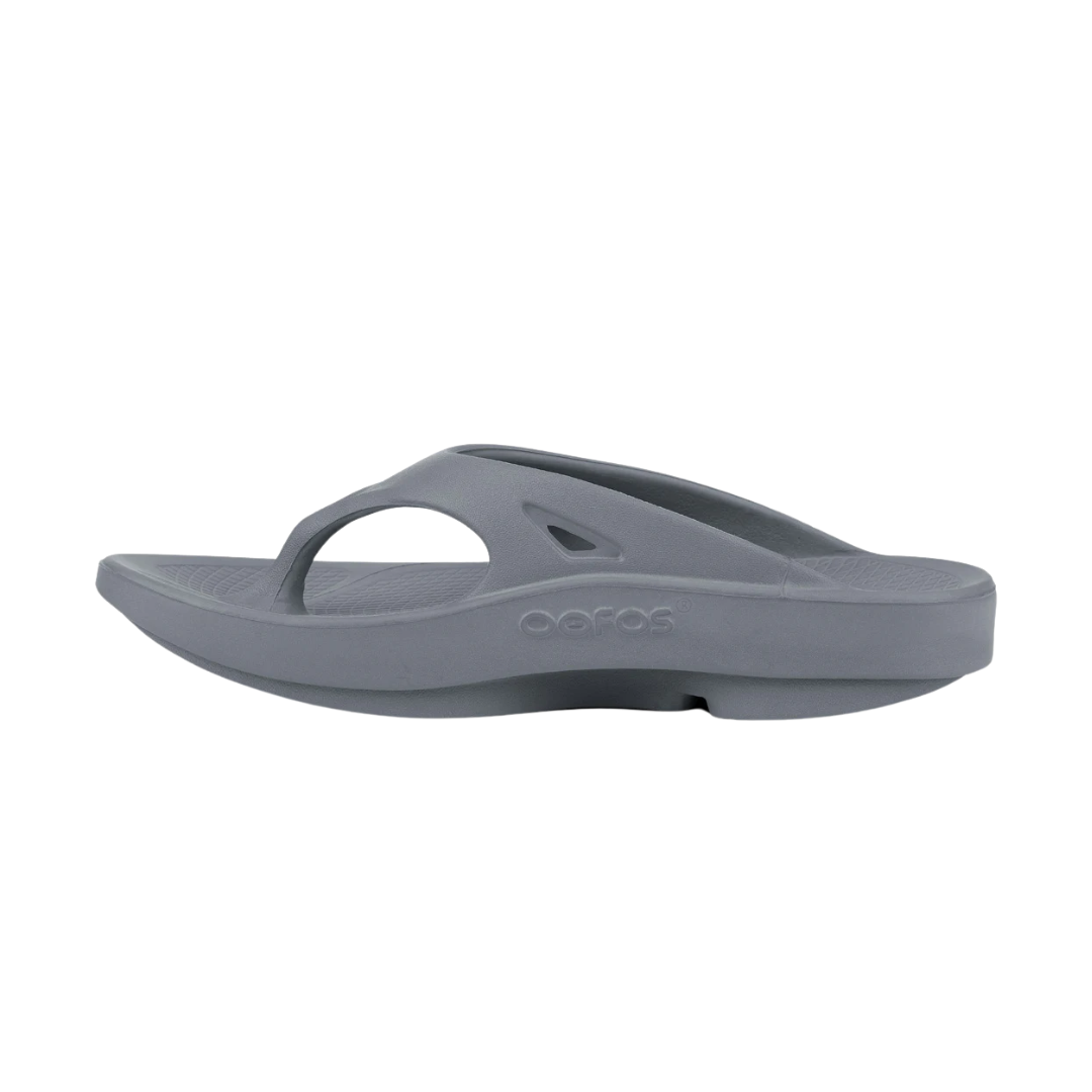 Side view of Women’s OOFOS OOriginal Sandal in slate – featuring a water-resistant synthetic upper, patented OOfoam™ midsole for enhanced shock absorption, contoured footbed with arch support, and a lightweight, recovery-ready silhouette.