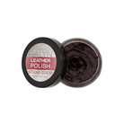 Open container of Ralyn Leather Shoe Polish in cordovan, showing rich, creamy polish texture inside designed to nourish and protect leather footwear.