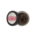 Open container of Ralyn Leather Shoe Polish in dark brown, showing rich, creamy polish texture inside designed to nourish and protect leather footwear.