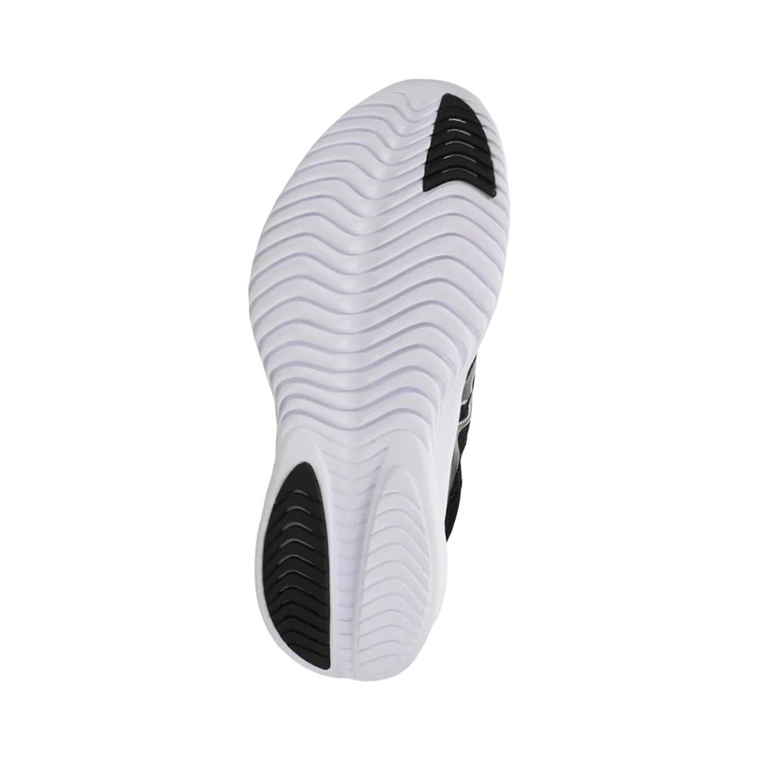Bottom View of Women’s Saucony Kinvara 14 Running Shoe in Black/White – Features include durable rubber outsole with strategic zones for traction, lightweight flexibility for natural movement, and minimal rubber placement for reduced weight.