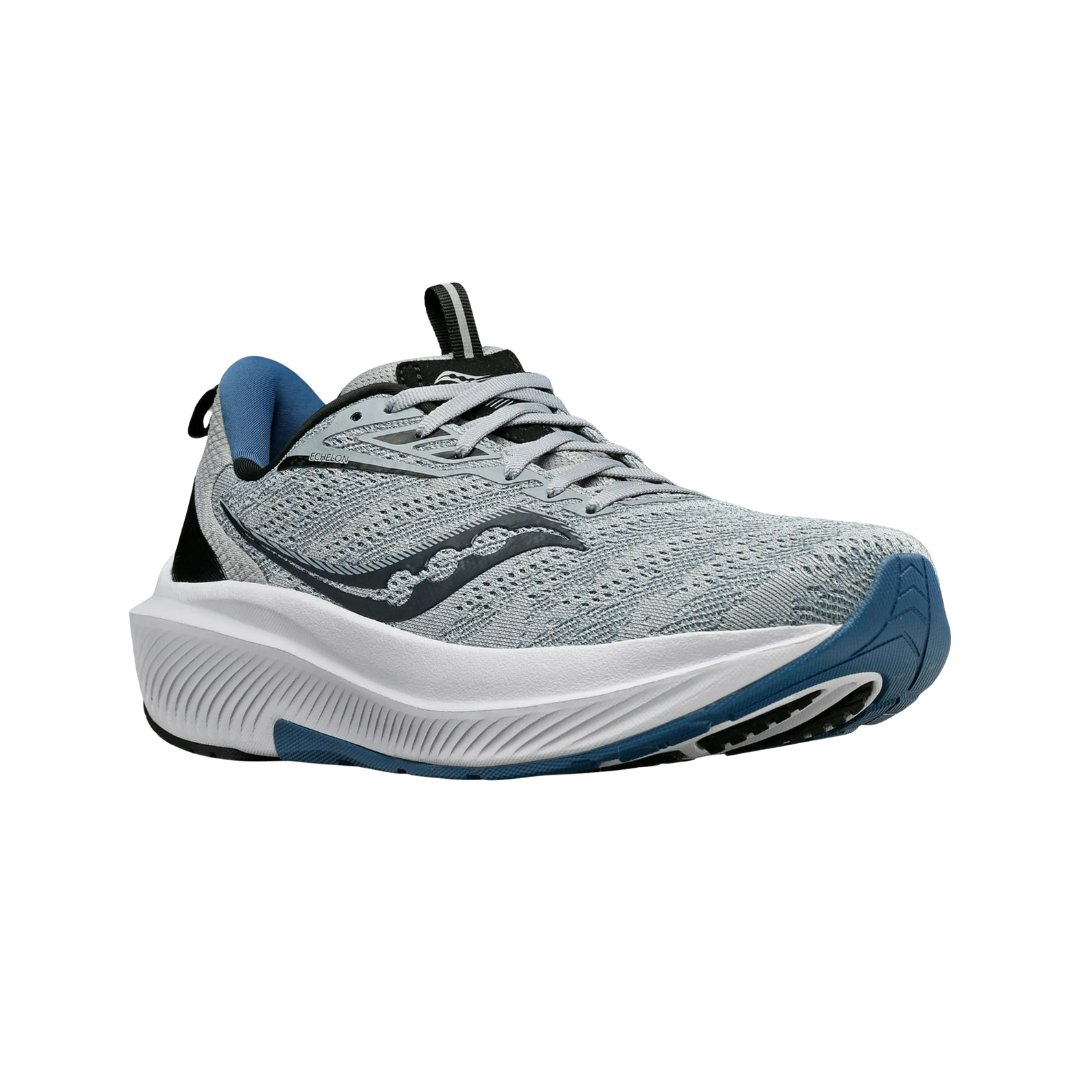 Angled view of Men’s Saucony Echelon 9 in Fossil/Murk – featuring a clean fossil-tone upper, soft cushioning, breathable materials, and a wide, supportive base designed for comfort, stability, and orthotic compatibility.