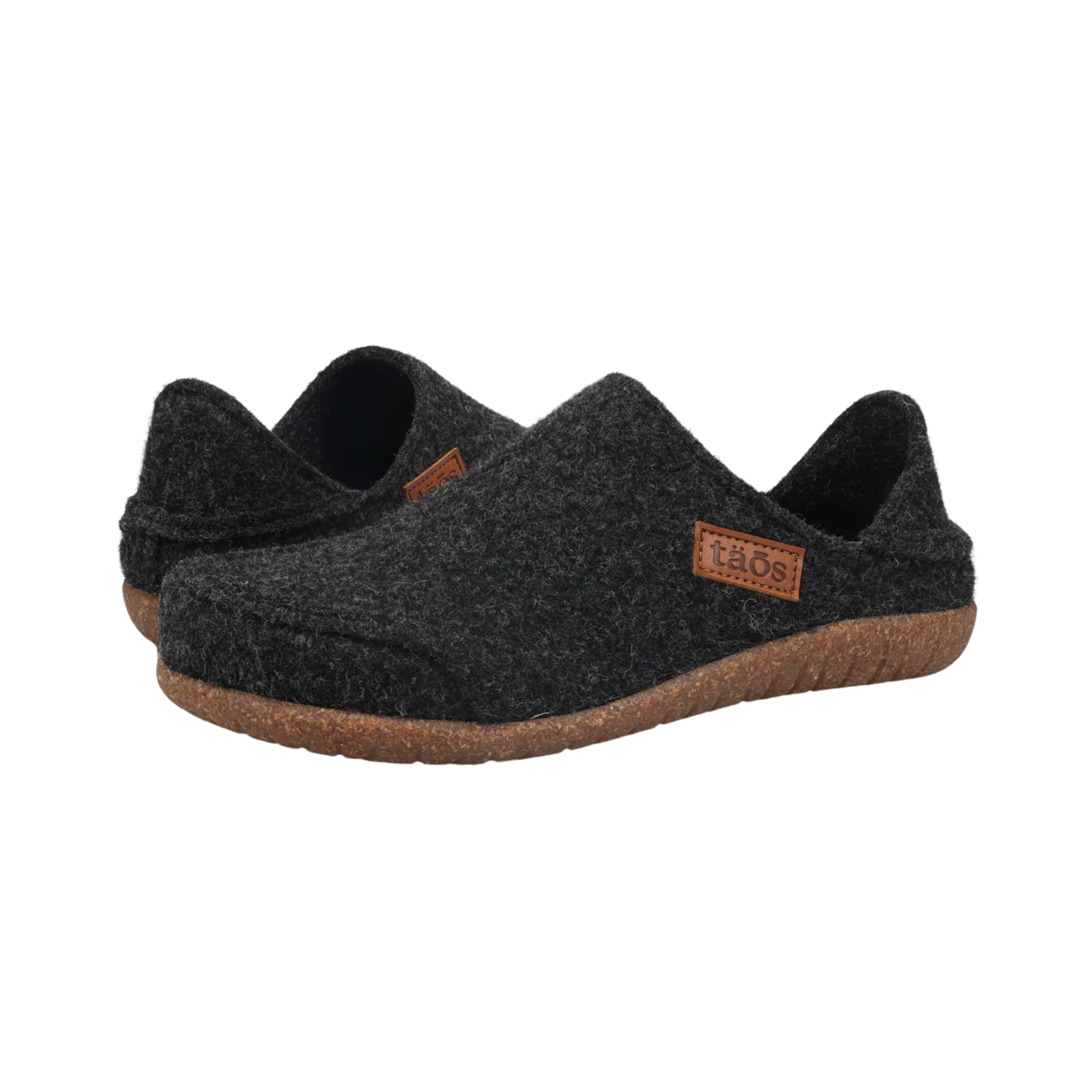 Angled View of Men's Taos Convertawool in Black – Featuring a cushioned footbed with Taos’ signature Arch Support for all-day comfort, along with a soft, wool-lined interior that enhances the warmth and cozy feel.