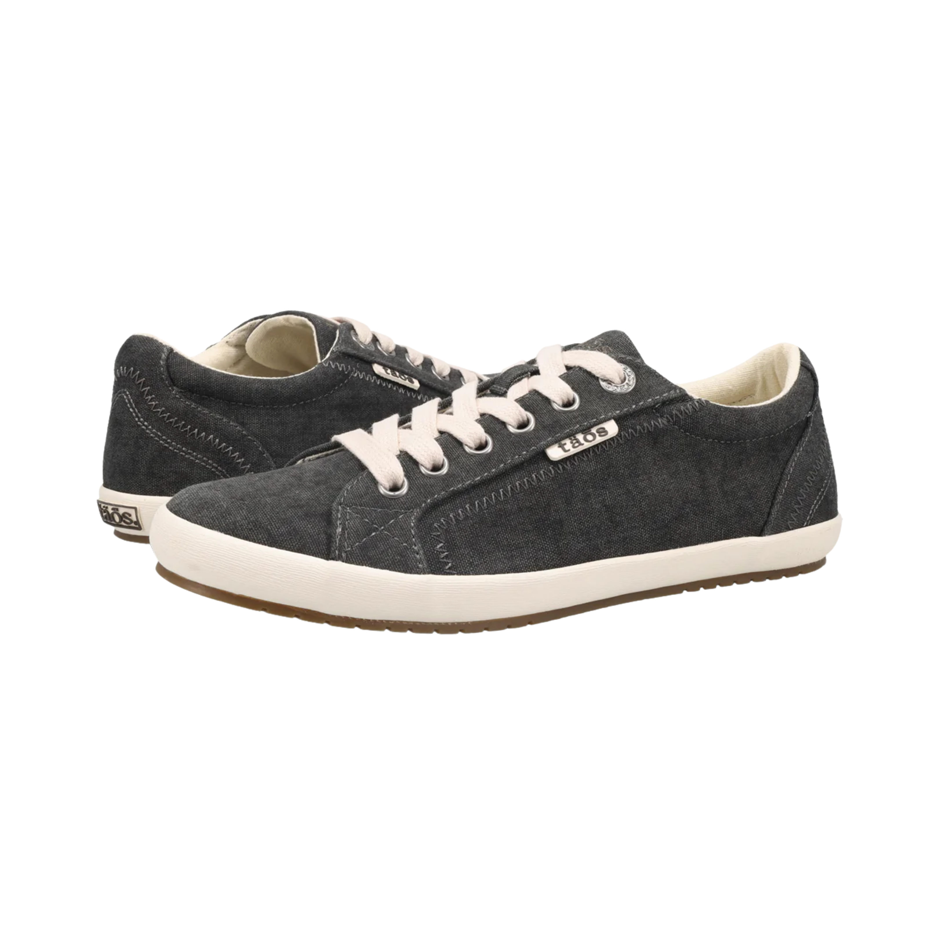 Angled View of Women's Taos Star in Charcoal Wash Canvas – Featuring a classic low-top design with a secure fit and cushioned insole for comfort throughout the day.