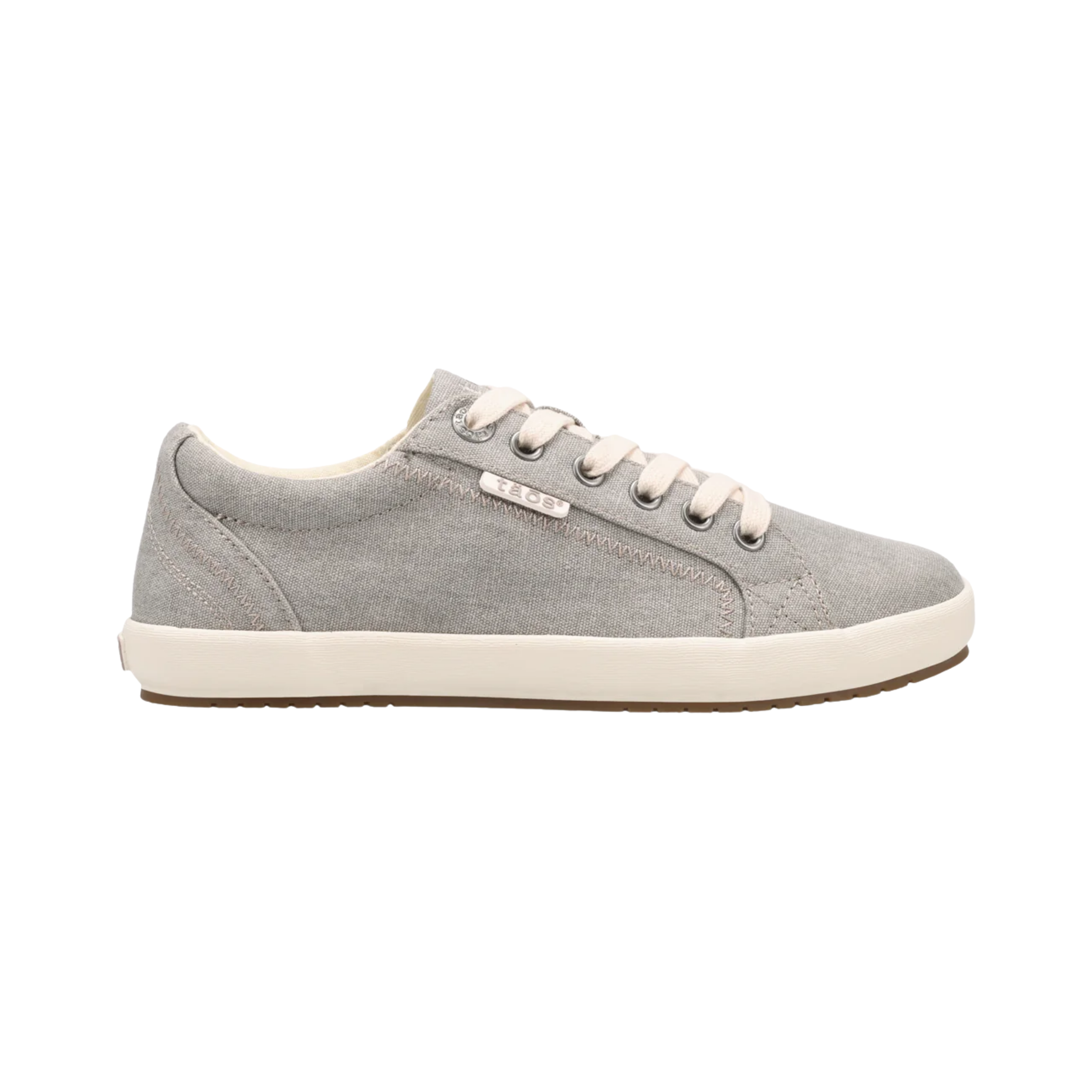 Side View of Women's Taos Star in Grey Wash Canvas – Featuring a classic low-top design, a soft canvas upper, and a flexible fit that pairs well with casual outfits.