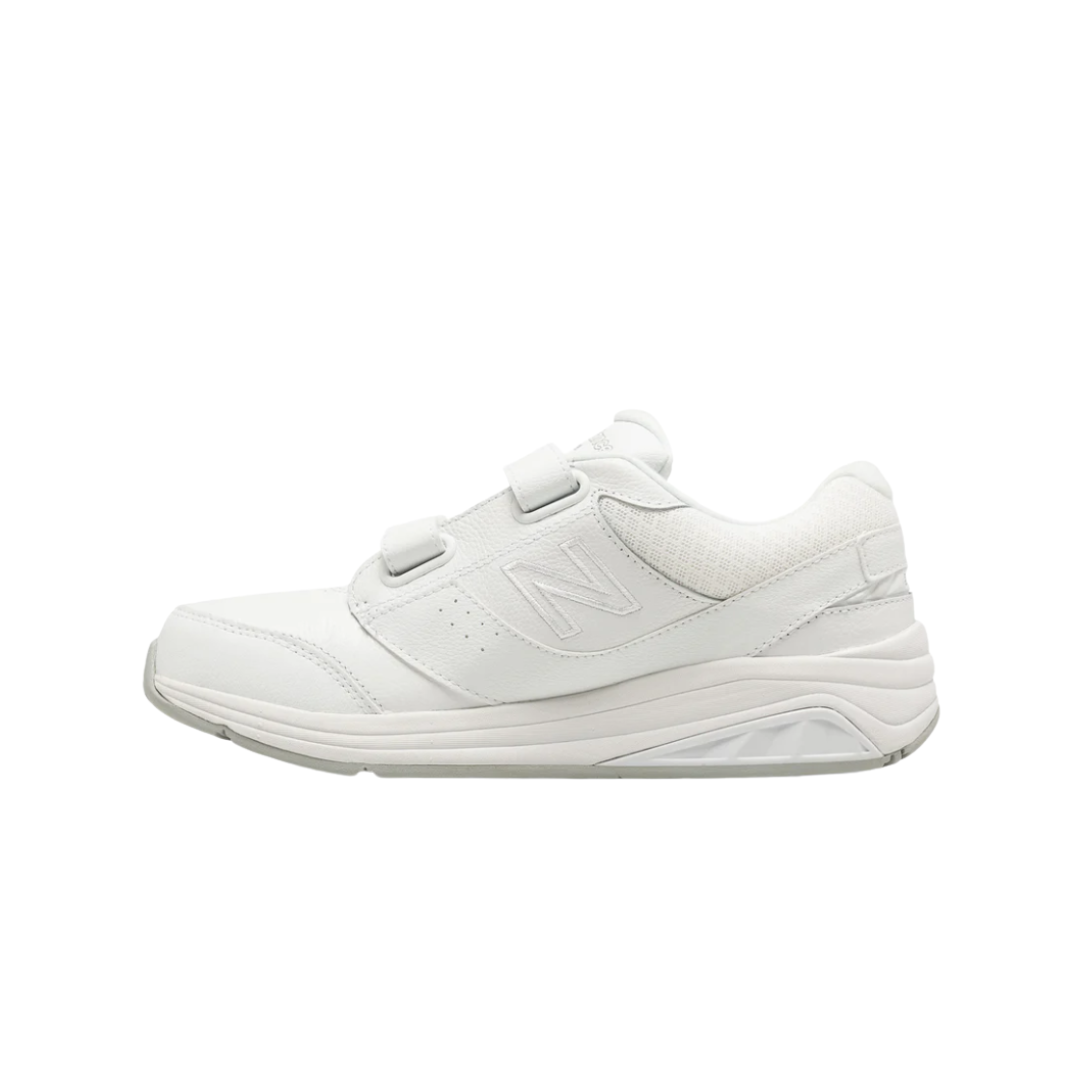 Side View of Women’s New Balance 928v3 Hook and Loop walking shoe in white – featuring dual hook-and-loop straps for easy adjustment, motion control midsole, and breathable panels for airflow.