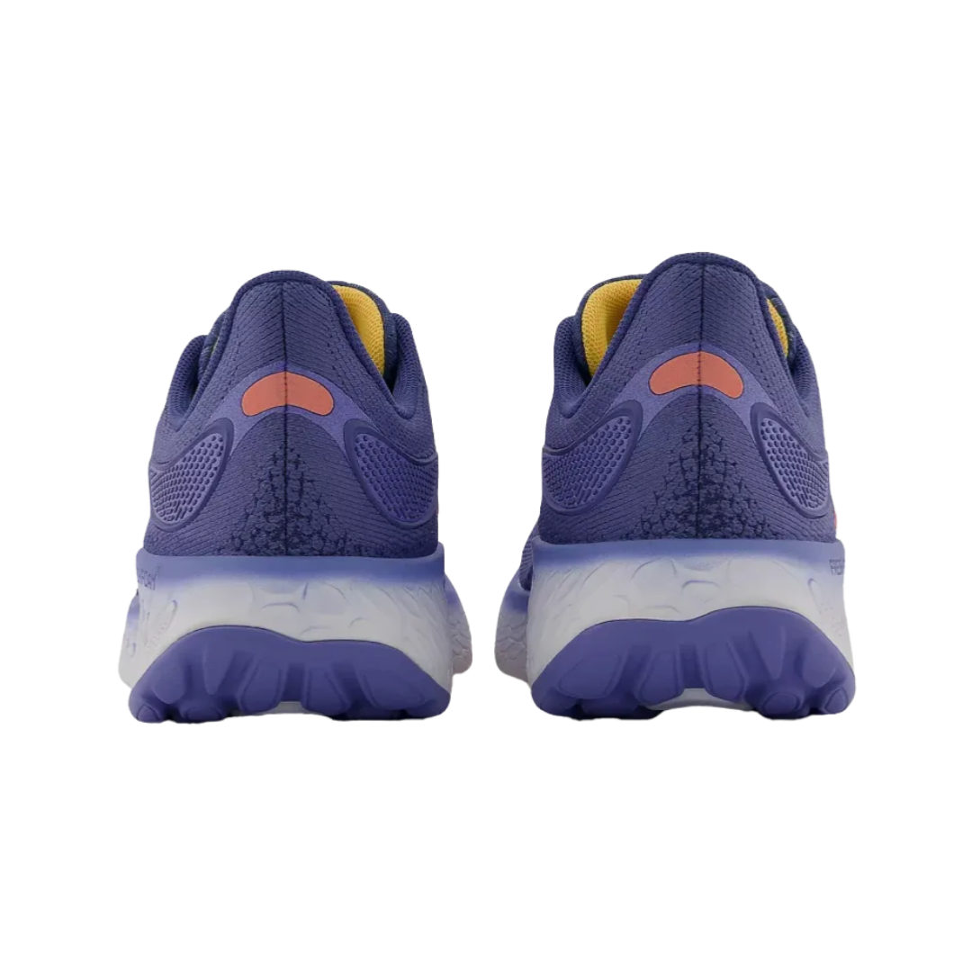 Back View of Women’s New Balance Fresh Foam X 1080v12 running shoe in night sky with vibrant orange – featuring structured heel counter for support, pull tab for easy on and off, and padded collar for ankle comfort.