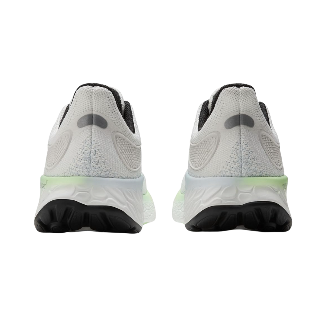 Back View of Women’s New Balance Fresh Foam X 1080v12 running shoe in white with bleach blue – featuring structured heel counter for support, pull tab for easy on and off, and padded collar for ankle comfort.