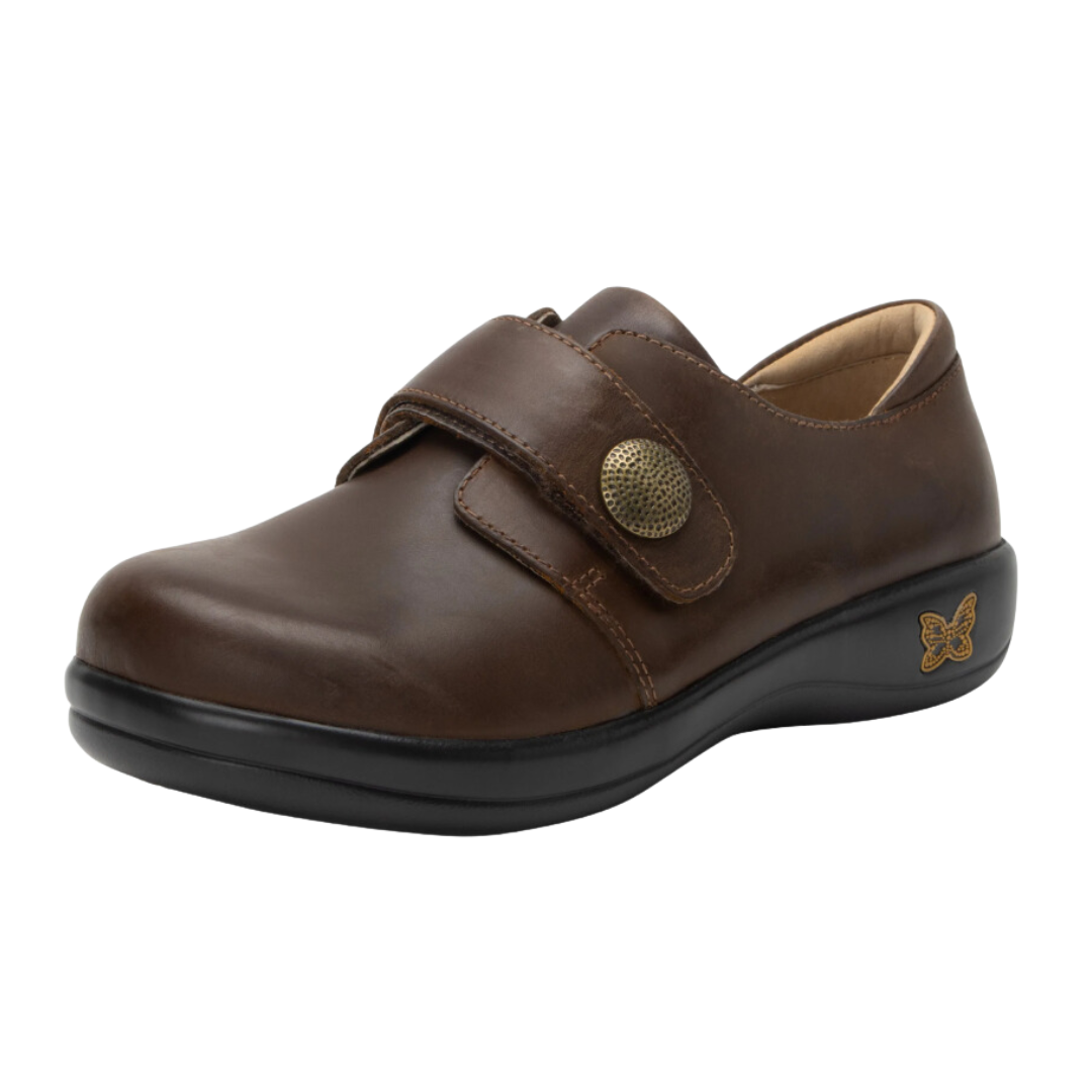 Side View of Women’s Alegria Joleen shoe in oiled brown – featuring a cushioned removable footbed, adjustable hook-and-loop strap, and slip-resistant outsole for lasting comfort.