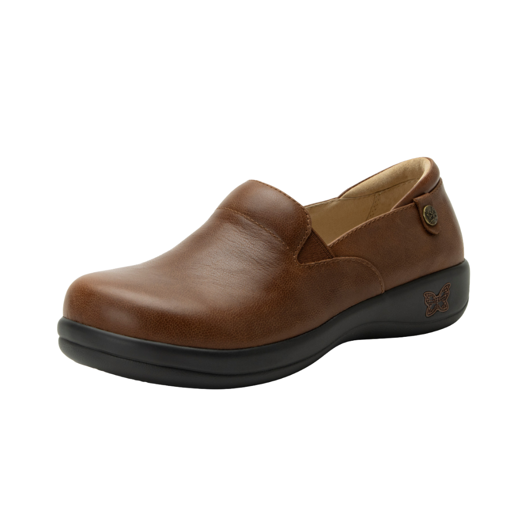 Side View of Women’s Alegria Keli shoe in walnut brown – featuring a cushioned removable footbed, slip-on design, and slip-resistant outsole for all-day support.