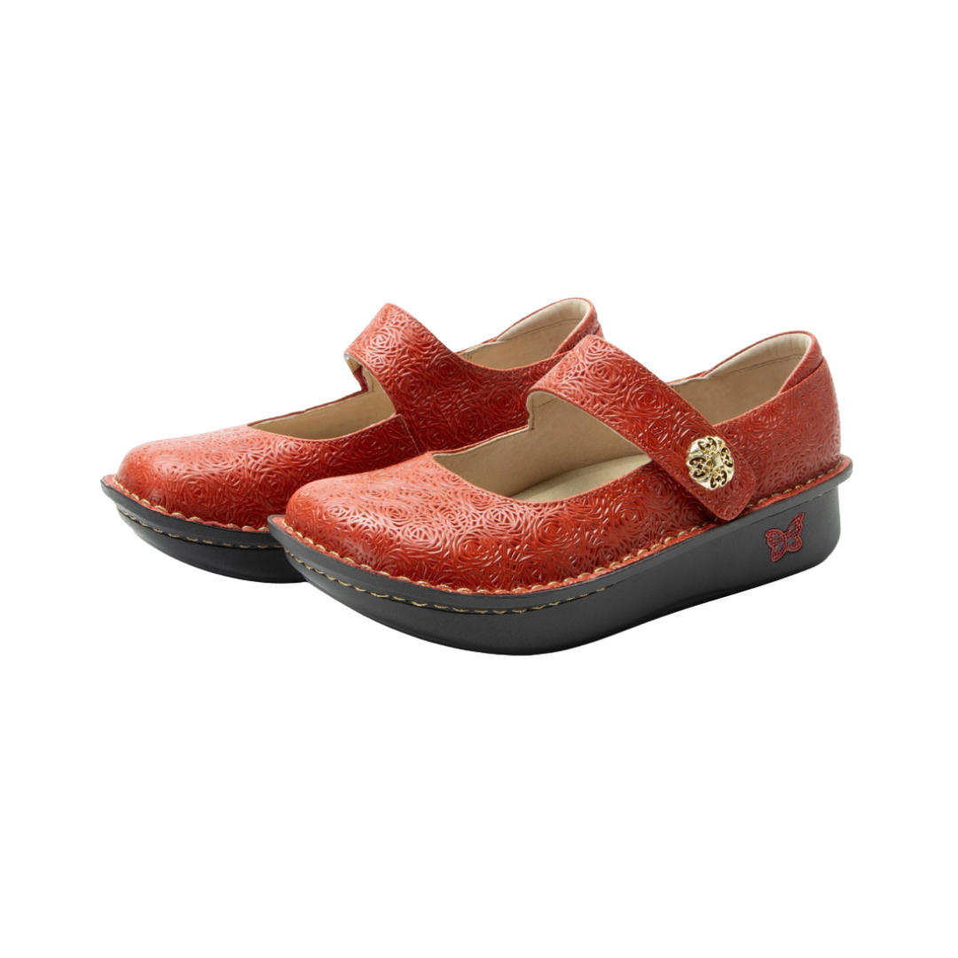 Side View of Women’s Alegria Paloma Mary Jane shoe in coral floral print – featuring a cushioned cork and memory foam footbed, adjustable hook-and-loop strap with decorative button, and slip-resistant outsole for all-day comfort.
