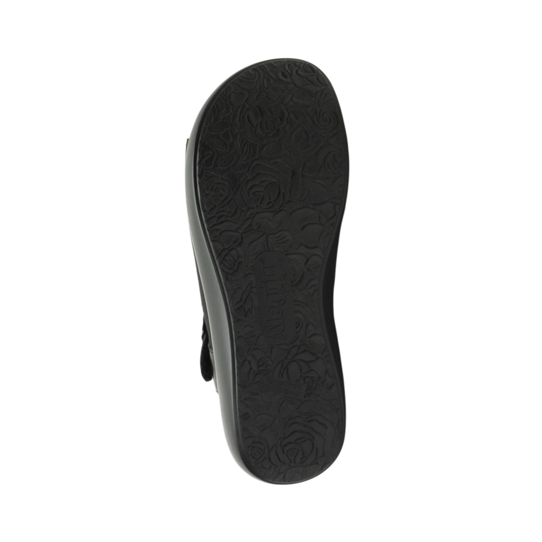 Bottom View of Women’s Alegria Betsie Stretch shoe in nightly black – featuring a slip-resistant patterned outsole, durable tread design, and lightweight construction for secure footing.