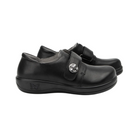 Side View of Women’s Alegria Joleen Work shoe in Upgrade Black – featuring a rocker outsole that promotes natural movement and reduces pressure on joints, a secure hook-and-loop strap for a personalized fit, and a clean, minimalist leather finish ideal for professional environments.