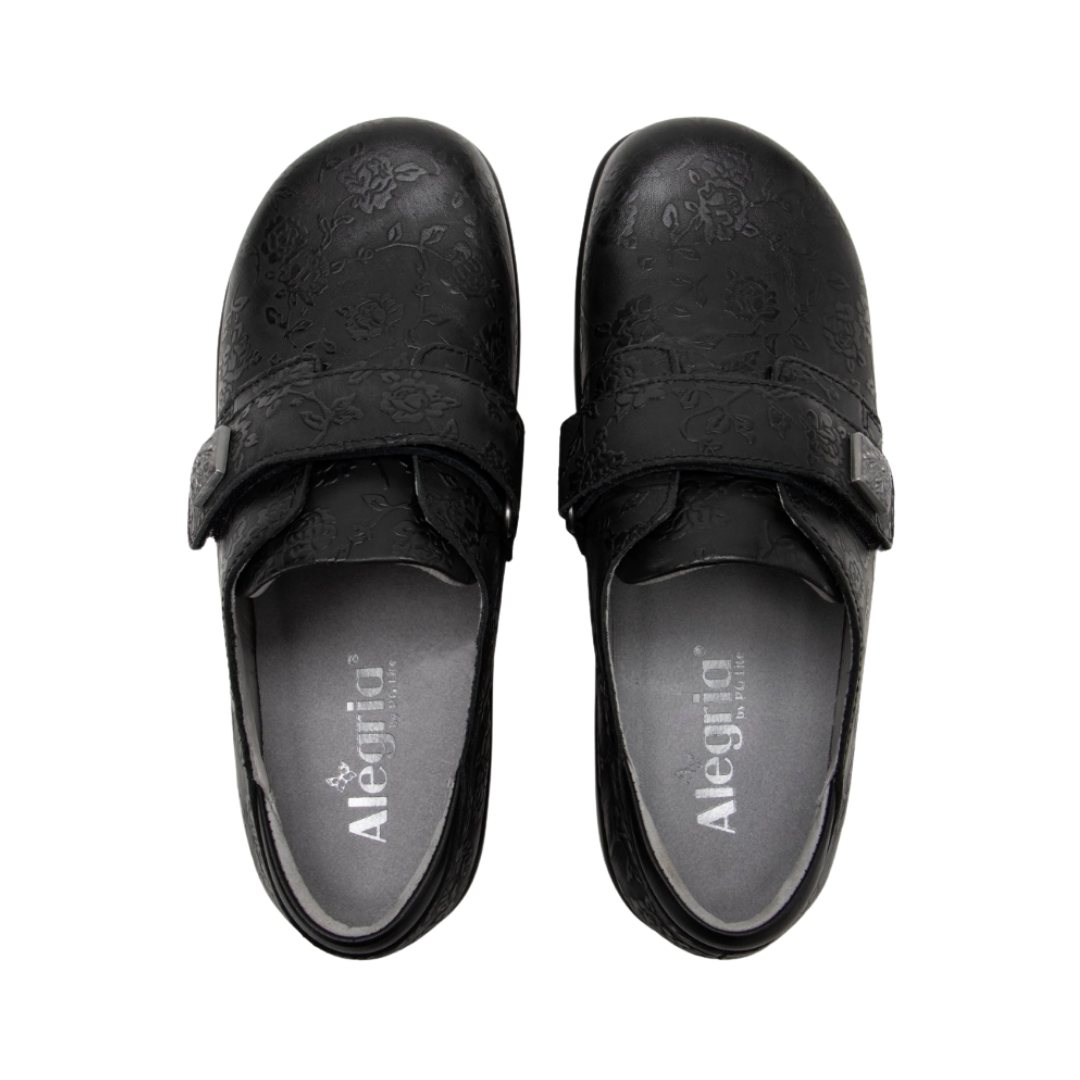 Top View of Women’s Alegria Joleen shoe in Class Act black – featuring a cushioned removable footbed, smooth leather upper, and adjustable hook-and-loop strap for a secure fit.