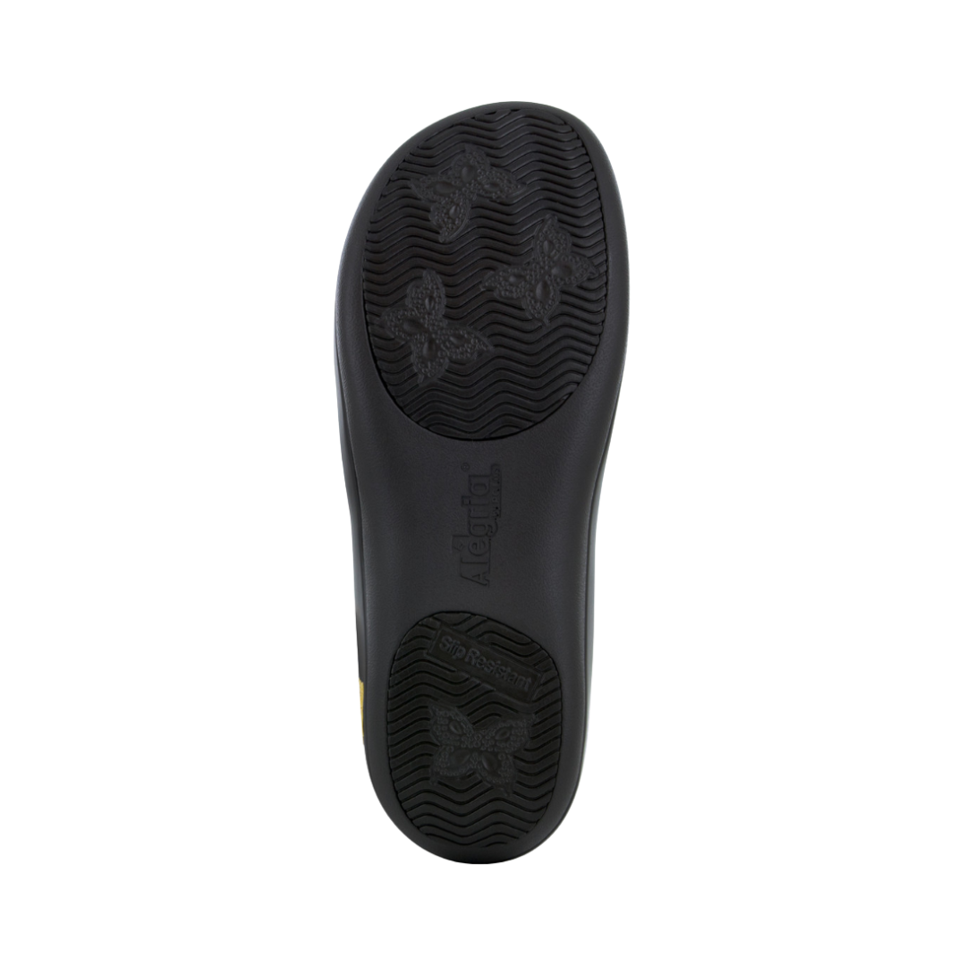 Bottom View of Women’s Alegria Joleen shoe in molasses tooled brown – featuring a slip-resistant patterned outsole, durable tread design, and lightweight construction for secure footing.