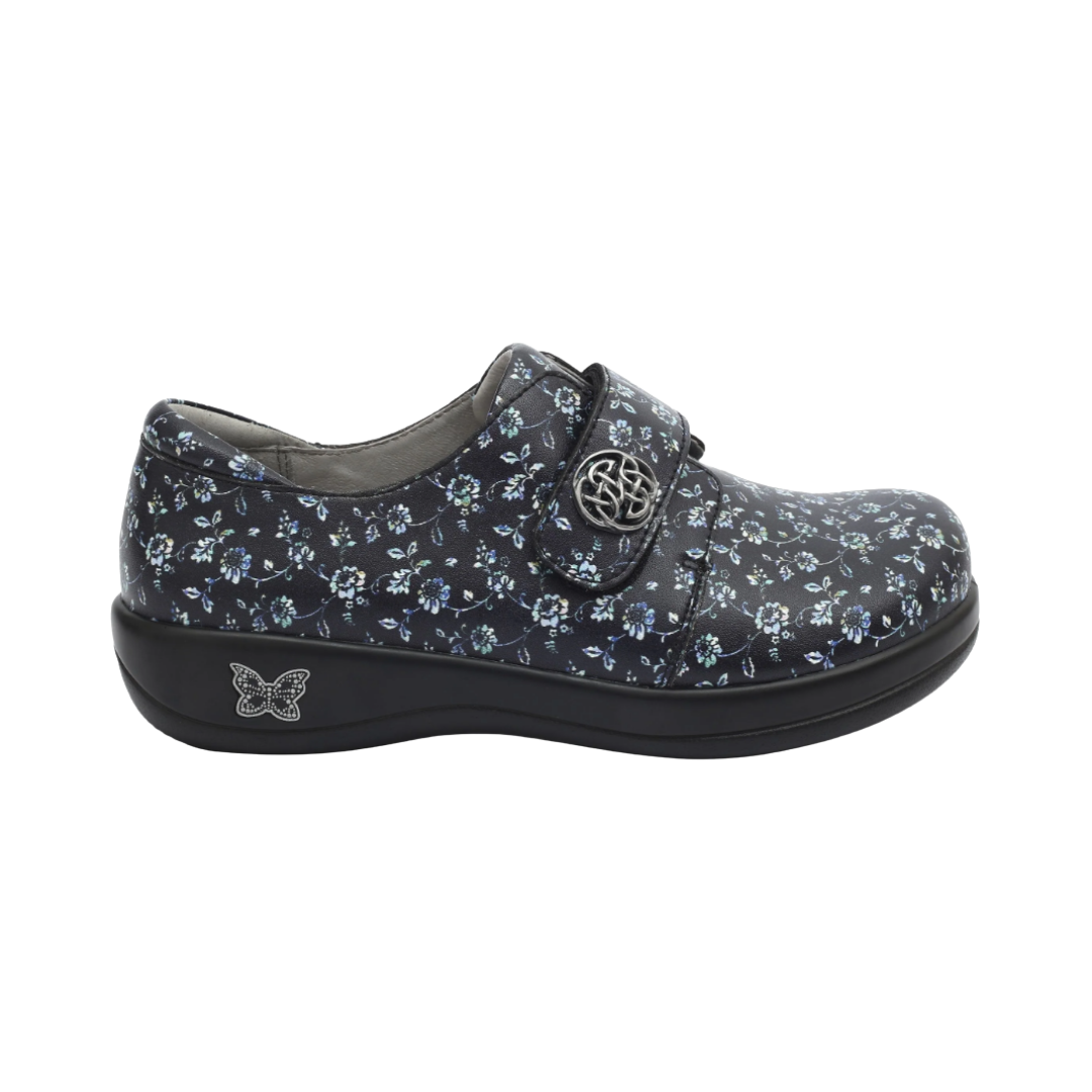 Side View of Women’s Alegria Joleen shoe in Work Pretty print – featuring a cushioned removable footbed, adjustable hook-and-loop strap, and slip-resistant outsole for lasting comfort.
