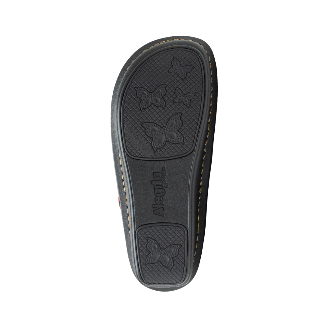 Bottom View of Women’s Alegria Paloma Mary Jane shoe in coralita multi – featuring a slip-resistant patterned outsole, durable tread design, and lightweight construction for secure footing.