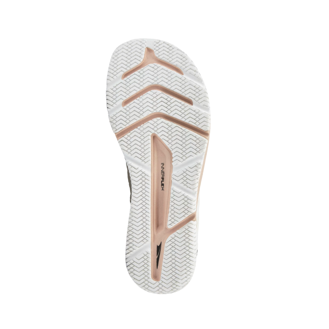 Bottom View of women’s Altra Solstice XT 2 in White – Featuring a durable rubber outsole with strategically placed flex grooves for optimal traction and flexibility during multi-surface training.