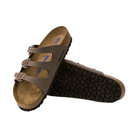 Angled View of Women’s Birkenstock Florida Soft Footbed Birkibuc sandal in mocha – featuring three slim Birkibuc synthetic straps with adjustable metal buckles for a personalized fit, anatomically shaped cork-latex soft footbed with integrated foam layer for extra cushioning, deep heel cup and raised toe bar to promote natural movement, and a lightweight EVA outsole for flexible, shock-absorbing support.