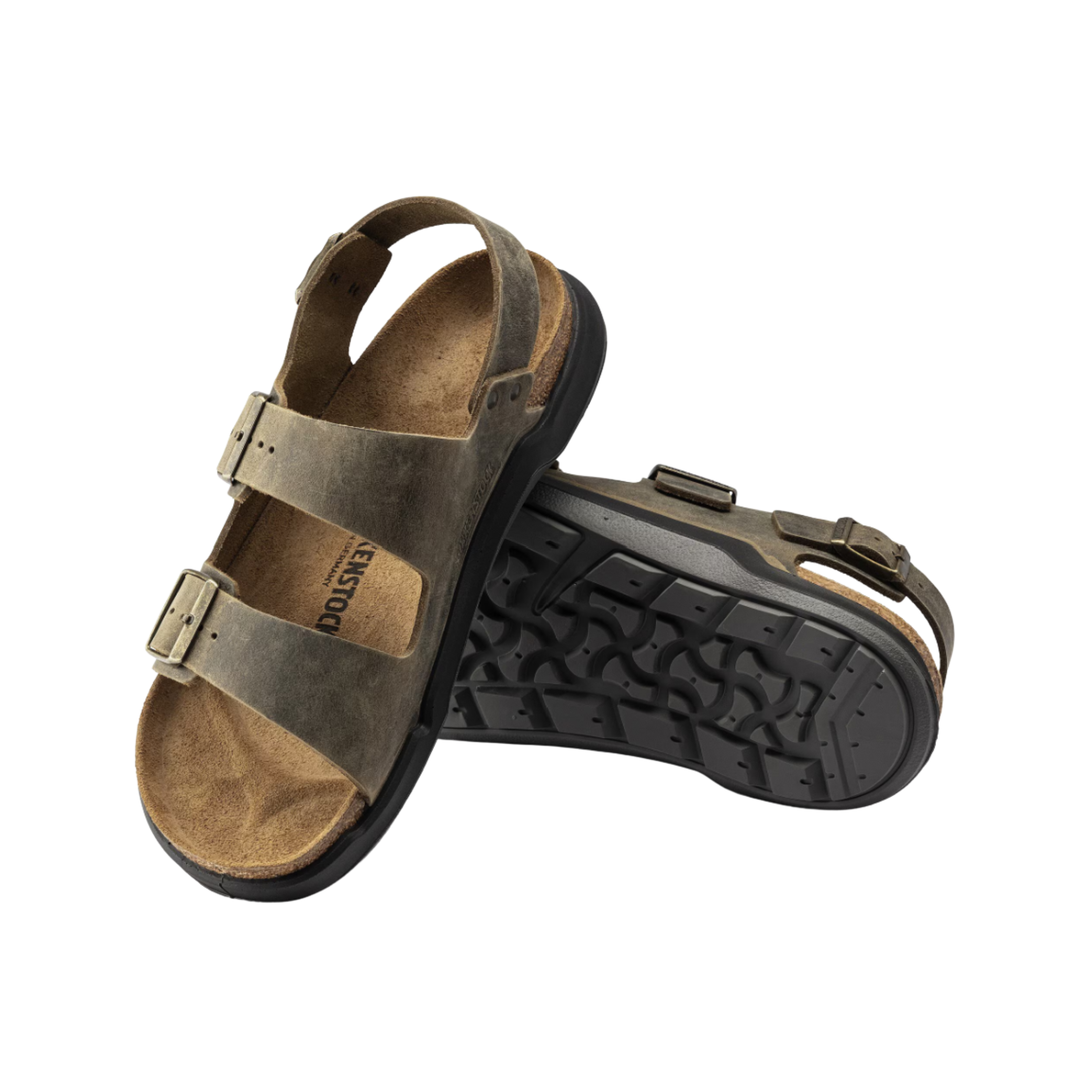 Angled View of Men’s Birkenstock Milano Rugged sandal in oiled leather faded khaki – featuring three thick oiled leather straps with adjustable metal buckles for a secure fit, an anatomically shaped cork-latex footbed for arch and heel support, and a rugged EVA outsole designed for enhanced traction and long-lasting wear.