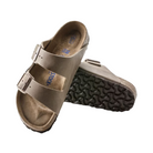 Angled View of Women’s Birkenstock Arizona Soft Footbed Oiled Leather sandal in Tobacco Brown – highlighting the gentle curve of the sandal’s footbed, the arch support, and the durable, long-lasting oiled leather construction.
