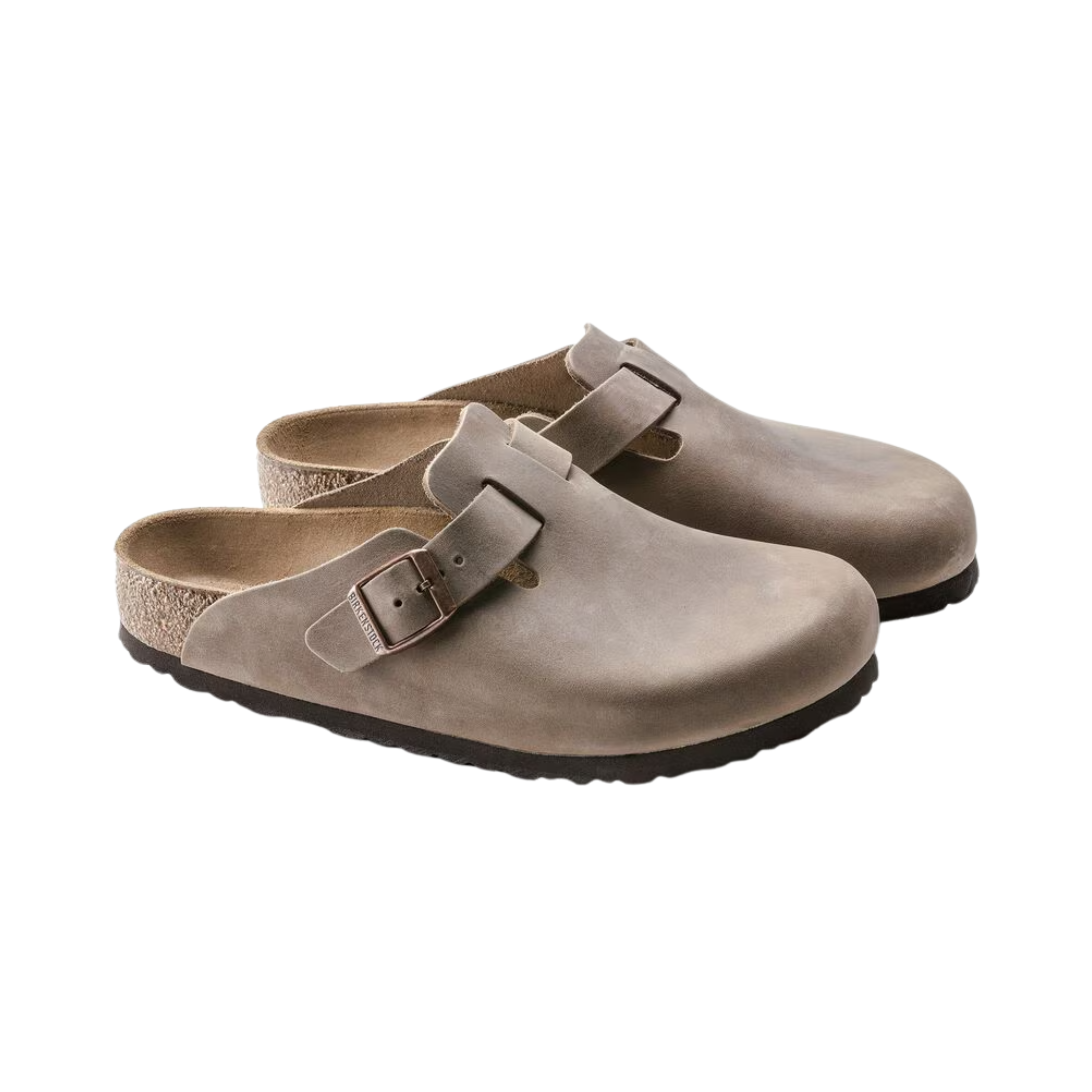 Side view of women’s Birkenstock Boston Oiled Leather clog in tobacco brown – featuring a sleek oiled leather upper, supportive arch construction, and durable EVA sole for long-lasting wear.