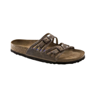 Side View of Women’s Birkenstock Granada Soft Footbed Oiled Leather sandal in tobacco brown – featuring dual oiled leather straps with elegant laser-cut detailing and adjustable metal buckles for a secure fit, contoured cork-latex soft footbed with an added foam layer for extra cushioning, deep heel cup and raised toe bar for natural alignment, and a lightweight EVA outsole for flexible, shock-absorbing support.