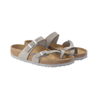 Side View of Women’s Birkenstock Mayari Soft Footbed Nubuck Leather sandal in dove grey – featuring soft nubuck leather straps with toe loop and crisscross design, adjustable metal buckles for a personalized fit, anatomically shaped cork-latex soft footbed with extra foam cushioning for enhanced comfort, and a lightweight EVA outsole for shock absorption and flexibility.