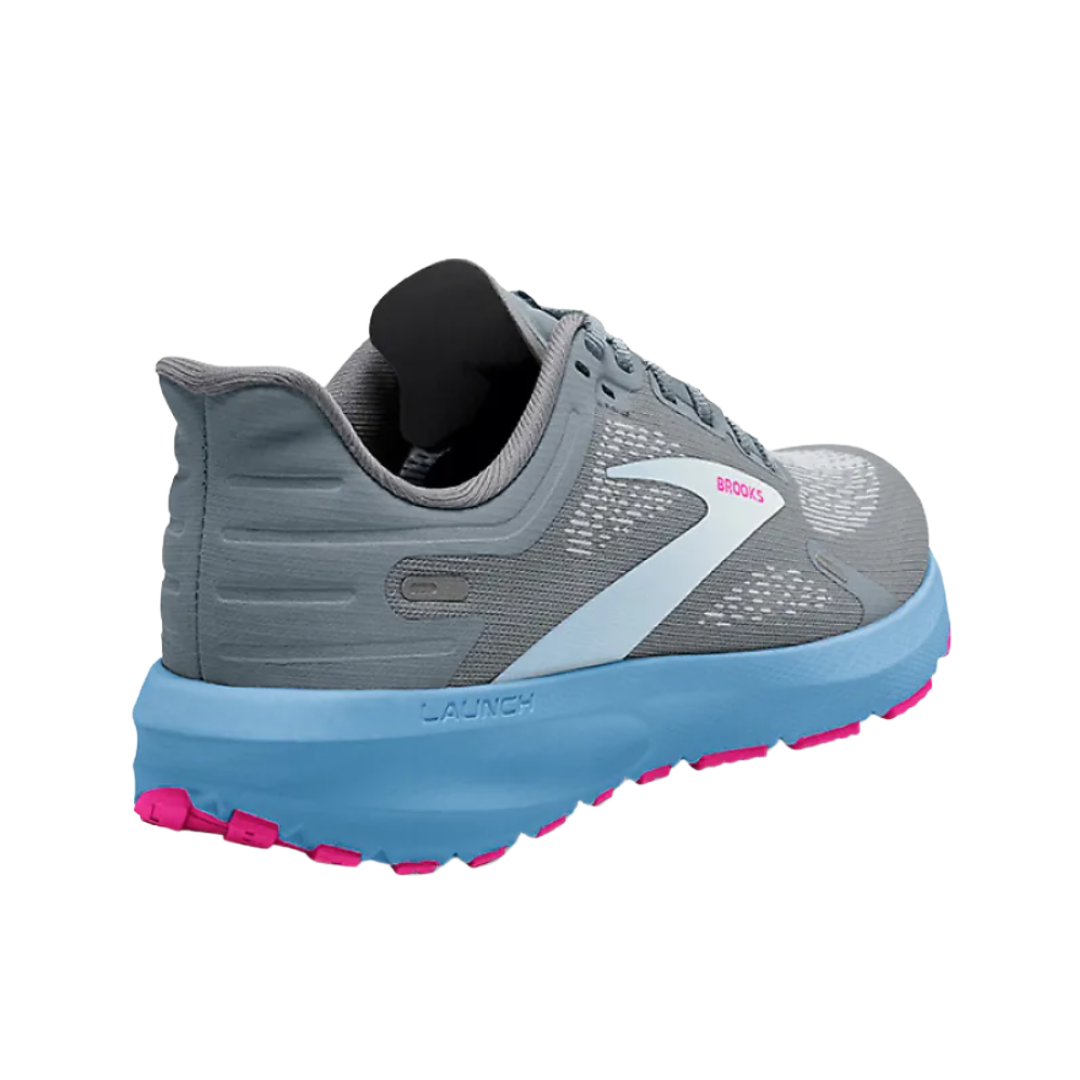 Side view of Women’s Brooks Launch 9 running shoe in grey, blue, and pink – featuring DNA Loft cushioning for responsive comfort, sleek profile, and supportive overlays.