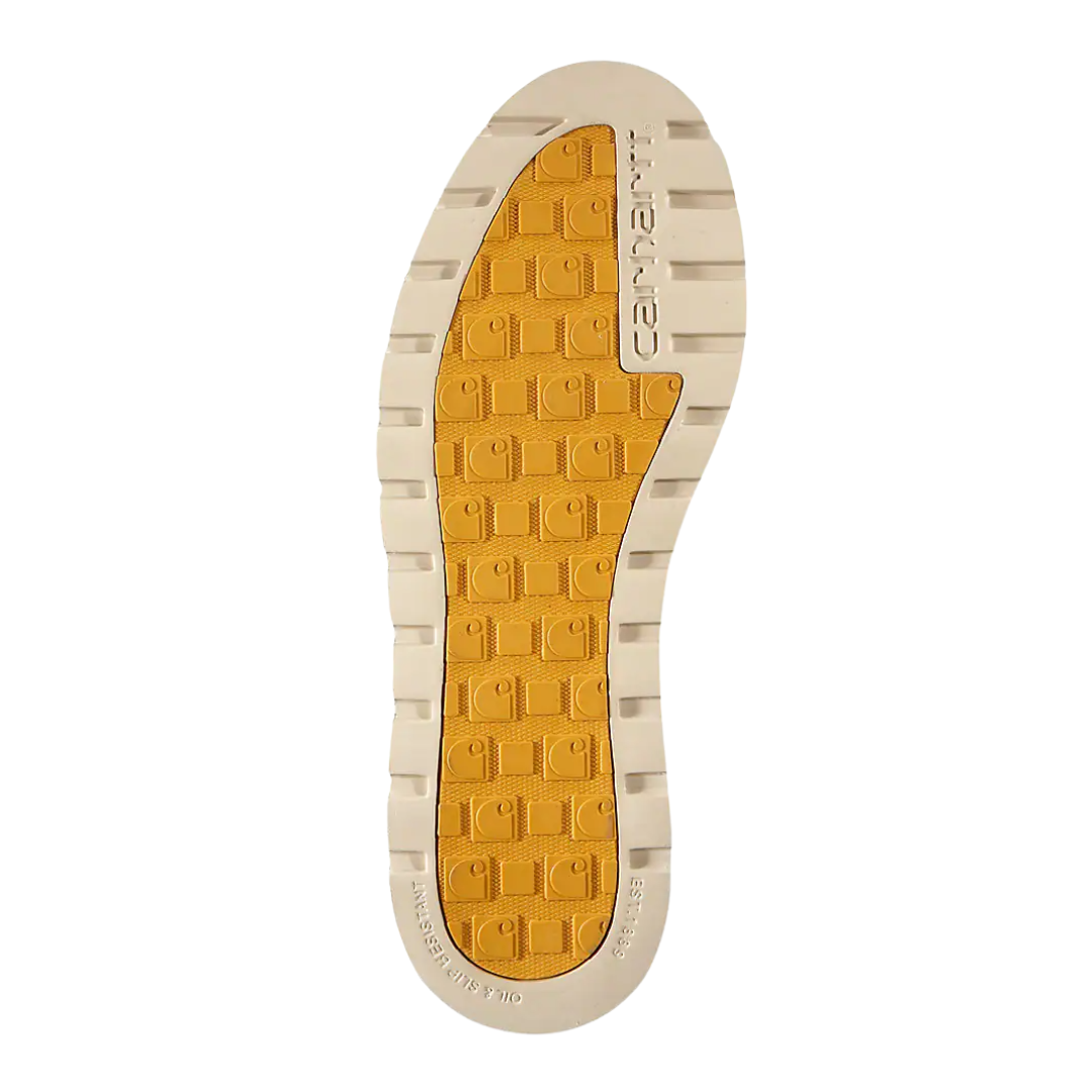 Bottom view of Men’s Carhartt Waterproof 6-Inch Moc Toe Wedge Boot in soft tan – highlighting dual-density rubber outsole with defined tread pattern for reliable grip on various surfaces.