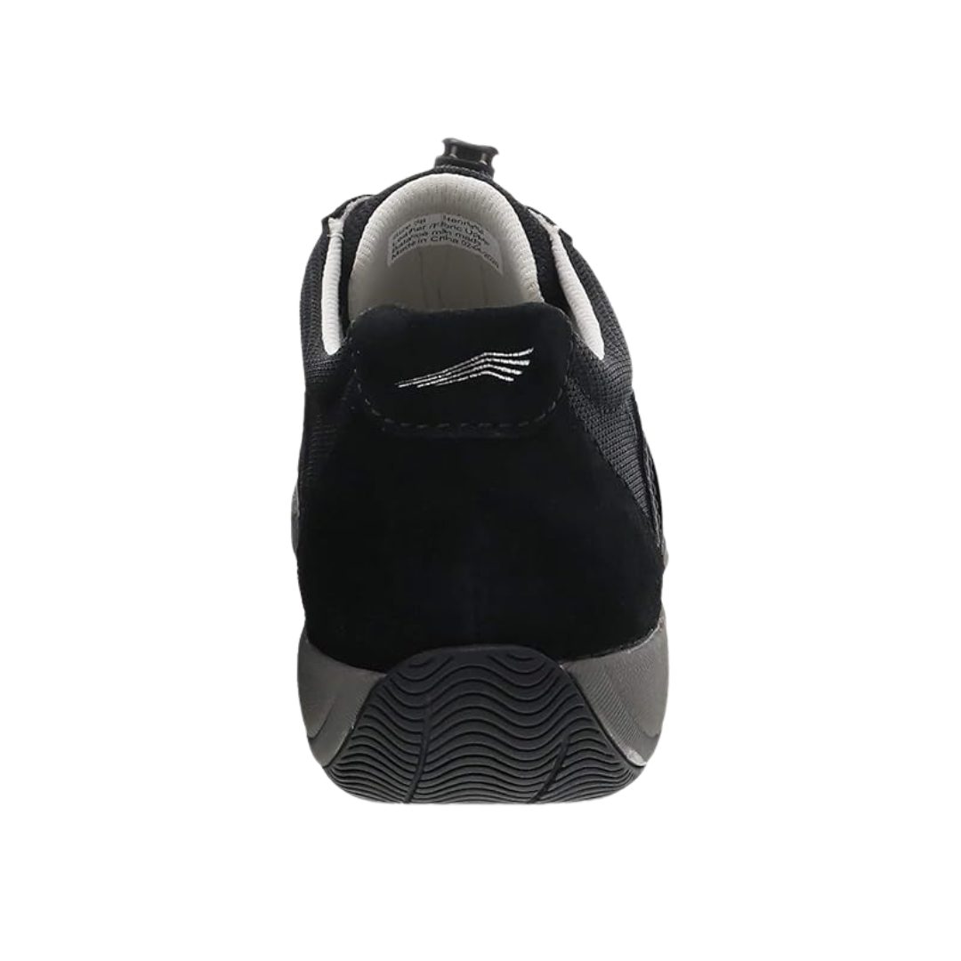 Back view of Women’s Dansko Henriette sneaker in black suede – featuring a padded heel collar, rear pull tab, and structured heel for stability.