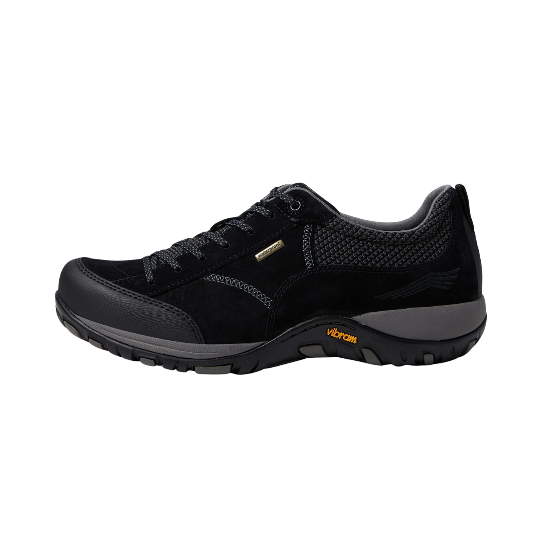 Side view of Women’s Dansko Paisley shoe in black suede – featuring waterproof suede material, side stitching details, and supportive midsole for daily walking comfort.