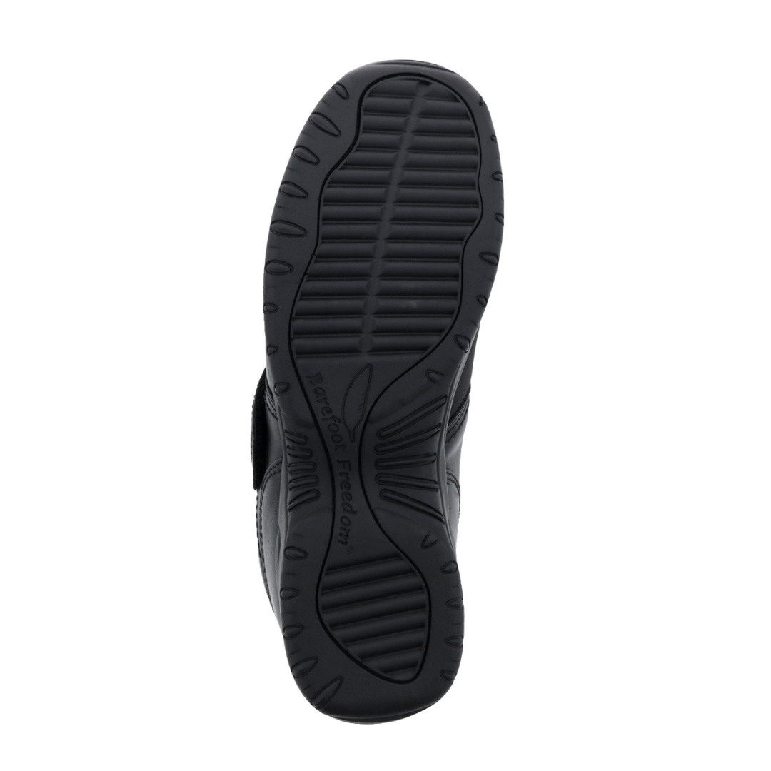 Bottom view of Women’s Drew Antwerp shoe in black leather – featuring a textured rubber outsole, rocker-style design, and full traction surface.