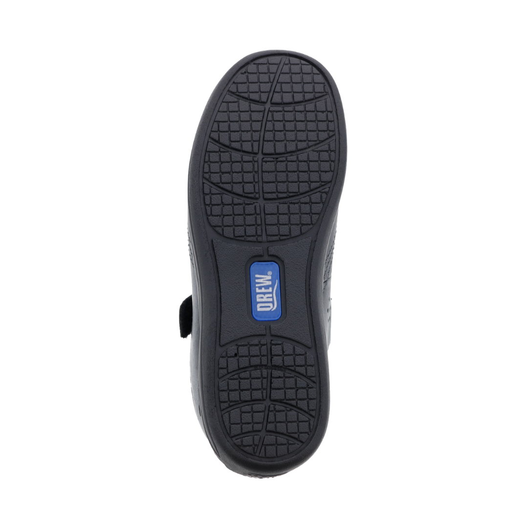 Bottom view of Women’s Drew Rose comfort shoe in black stretch – featuring a slip-resistant outsole, rocker bottom design, and full-ground contact tread.