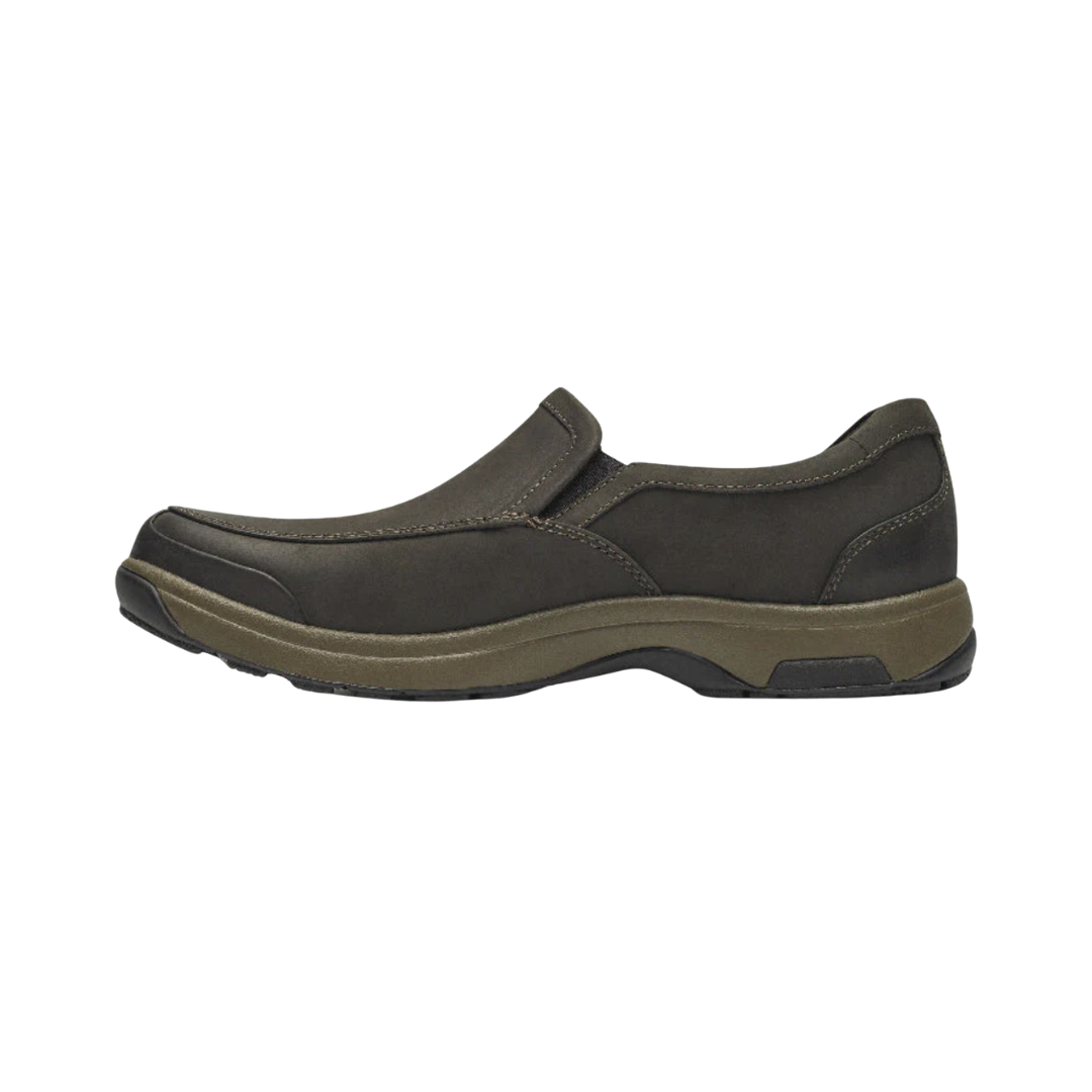 Side View of Men’s Dunham Battery Park Slip-On shoe in brown nubuck – featuring waterproof construction, supportive midsole for shock absorption, and a classic slip-on profile with smooth, durable nubuck leather.