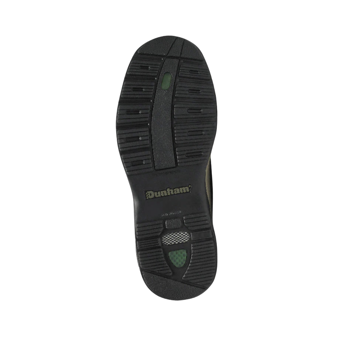 Bottom View of Men’s Dunham Battery Park Slip-On shoe in brown nubuck – featuring a slip-resistant rubber outsole with textured tread pattern designed for stability on various surfaces.
