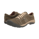 Angled View of Men’s Keen Austin Canvas shoe in military olive/safari – featuring a breathable canvas upper with reinforced stitching for durability, a secure lace-up closure for a customized fit, cushioned footbed for all-day comfort, and a lightweight flexible rubber outsole designed for versatile traction on urban and outdoor surfaces. The shoe also includes padded collar and tongue for added ankle support and a durable toe cap for protection.