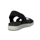 Back view of Women’s Elle Strappy sandal in black and vapor – featuring adjustable heel strap with buckle closure, low-profile heel for stability, and clean rear design for versatile pairing.