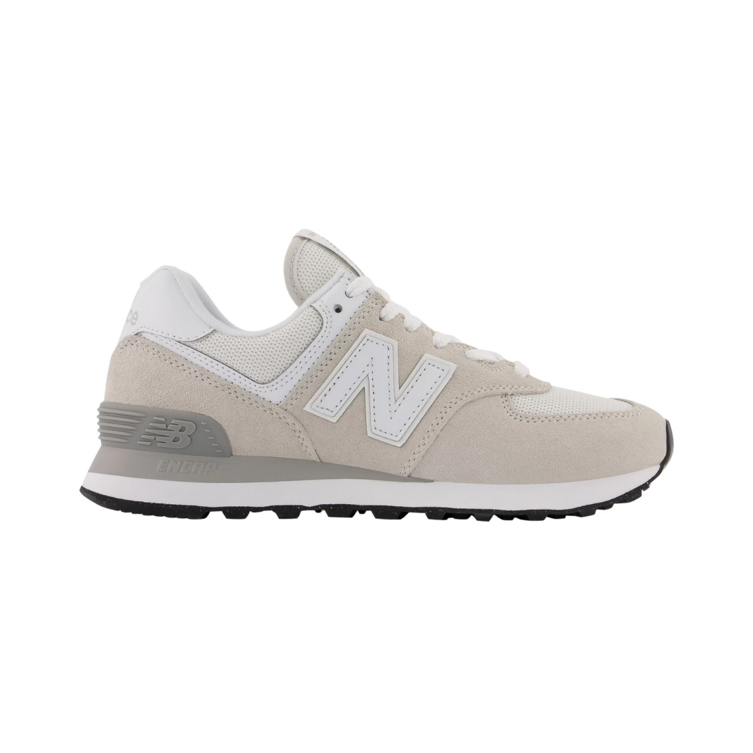 Side View of Women’s New Balance 574 Core lifestyle sneaker in nimbus cloud with white – featuring ENCAP midsole cushioning, suede and mesh paneling, and  reinforced heel traction.