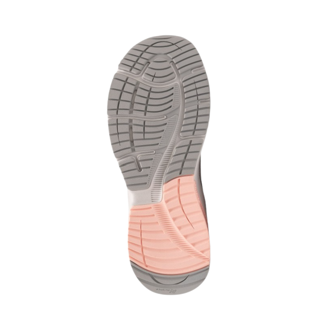 Bottom view of Women's New Balance 847v4 athletic shoe in arctic fox, silver mink, and peach soda – showcasing a durable rubber outsole with traction patterns for enhanced grip and flexibility.